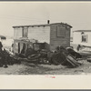 Backyard of shack in "Shantytown," Spencer, Iowa