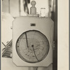 Automatic recording thermometer in cooperative creamery at Ruthven, Iowa. The latest scientific instruments are used here