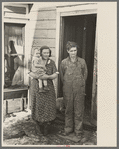 Mr. Rauhauser, wife and one of his seven children, Ruthven, Iowa. He works as a farm hand. At present he is out of work. He has made application for direct relief