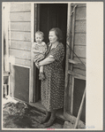 Mrs. Rauhauser and one of her seven children, Ruthven, Iowa