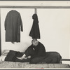 Man examining ankle, homeless men's bureau, Sioux City, Iowa