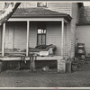 Front porch of house occupied by Mrs. Mary Kelsheiner and sons, Miller Township, Woodbury County, Iowa