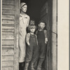 Mrs. Frank Moody with two of her seven children on their eighty acre farm in Miller Township, Woodbury County, Iowa