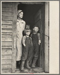 Mrs. Frank Moody with two of her seven children on their eighty acre farm in Miller Township, Woodbury County, Iowa