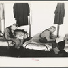 Men reading in dormitory, homeless men's bureau, Sioux City, Iowa