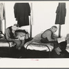 Men reading in dormitory, homeless men's bureau, Sioux City, Iowa