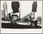 Men reading in dormitory, homeless men's bureau, Sioux City, Iowa