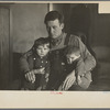 J. Donnell Champion and his two children who received a start from resettlement two years ago. He has applied for a resettlement grant for feed to get his livestock through the winter