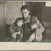 J. Donnell Champion and his two children who received a start from resettlement two years ago. He has applied for a resettlement grant for feed to get his livestock through the winter