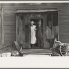 Mr. and Mrs. John Landers, tenant farmers, at the backdoor of their farmhouse, near Marseilles, Illinois
