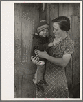Mrs. John Scott, wife of a hired man and one of her six children, near Ringgold, Iowa