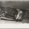 Young flood refugee asleep in schoolhouse, Sikeston, Missouri