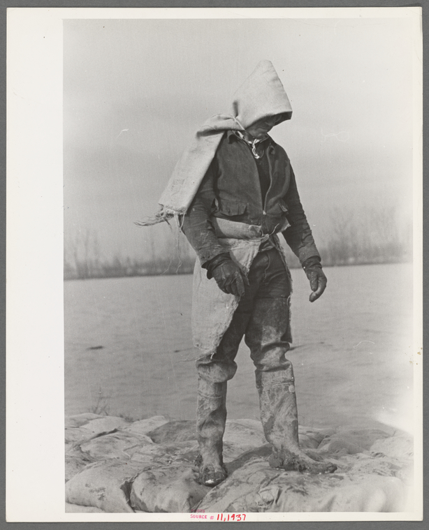 Levee worker during the flood