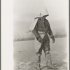 Levee worker during the flood, on a raw day with a thirty-mile wind. These men are very cold and almost exhausted from constant work