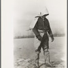 Levee worker during the flood, on a raw day with a thirty-mile wind. These men are very cold and almost exhausted from constant work