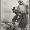 Levee worker during the flood, on a raw day with a thirty-mile wind. These men are very cold and almost exhausted from constant work. Birds Point, Missouri