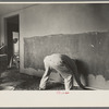 Man plastering wall in Greenhills, Ohio house