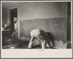 Man plastering wall in Greenhills, Ohio house
