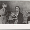 Mother and two children, flood refugees in the schoolhouse at East Prairie, Missouri