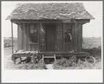 Front porch of sharecropper cabin, New Madrid County, Missouri