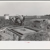 Food storage. Forms for foundations all ready for the pouring of concrete. Note that food storage building is almost completely above grade. Water table extremely high. Southeast Missouri Farms Project