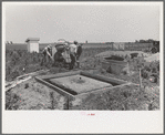 Food storage. Forms for foundations all ready for the pouring of concrete. Note that food storage building is almost completely above grade. Water table extremely high. Southeast Missouri Farms Project