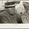 Spectator at livestock auction, Sikeston, Missouri