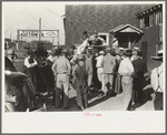 Group of farmers at peach auction, Sikeston, Missouri