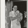 Wife and child of sharecropper, cut-over farmer in bottoms of Mississippi River