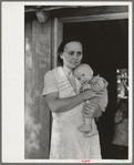 Wife and child of sharecropper, cut-over farmer in bottoms of Mississippi River