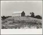Barn on a hummock in Bird's Point, New Madrid Fuse Plug Levee District. Elevation is artificially made so as to be above flood level