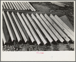 Food storage plant. Stack of feed storage gable ends. Southeast Missouri Farms Project