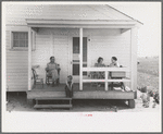 Southeast Missouri Farms. FSA (Farm Security Administration) clients on front porch of new home