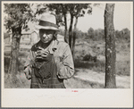 Henry Holt, Negro farmer near Black River Falls, Wisconsin, who is being moved off submarginal land by Resettlement Administration