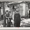 Alonzo Heath with two of his children. He is a farmer near Black River Falls, Wisconsin