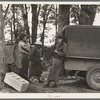 Blueberry pickers getting ready to go into the fields, near Little Fork [i.e. Littlefork], Minnesota