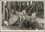 Airing bedding, blueberry pickers camp near Little Fork [i.e. Littlefork], Minnesota