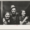 Lumberjack and two "attendants" in saloon of Craigville, Minnesota