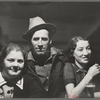 Lumberjack and two "attendants" in saloon of Craigville, Minnesota