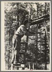 William Besson working on his drilling rig on location, near Winton, Minnesota