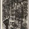 William Besson and his drilling rig. Near Winton, Minnesota