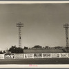 Signs and lighting standards at baseball park, Saint Paul, Minnesota