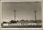 Signs and lighting standards at baseball park, Saint Paul, Minnesota