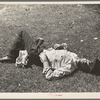 Transient laborer asleep in park, Gateway District, Minneapolis, Minnesota
