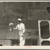 The auctioneer at S.W. Sparlin sale, Orth, Minnesota