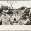 Women at auction sale, Orth, Minnesota