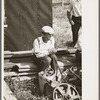 Man at auction sale, Sparlin farm, Orth, Minnesota