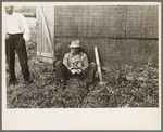 Man at S.W. Sparlin sale, Orth, Minnesota