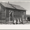 Children in front of Olaf Fugelberg's farmhouse. Williams County, North Dakota