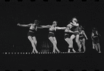 Joel Grey and ensemble dancers in the stage production Cabaret
